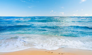 拍打著沙灘的海水風(fēng)景攝影高清圖片