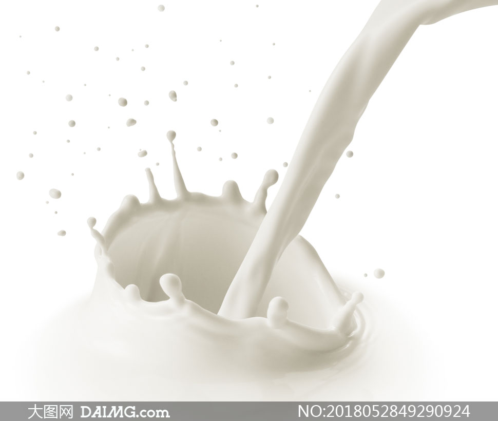在倒牛奶时的奶花特写摄影高清图片