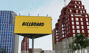 矗立在城市建筑间的广告牌样机模板